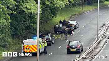 Woman hurt after car flips onto roof on Clydeside Expressway