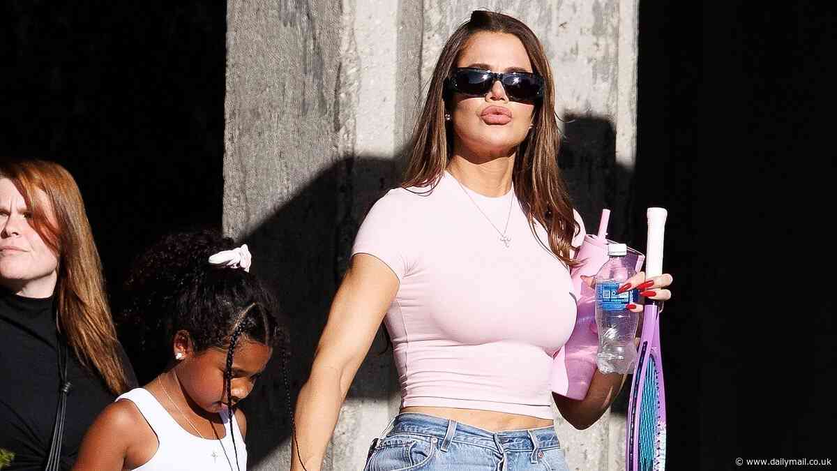 Khloe Kardashian debuts plump pout while playing happy family with ex Tristan Thompson and their two kids