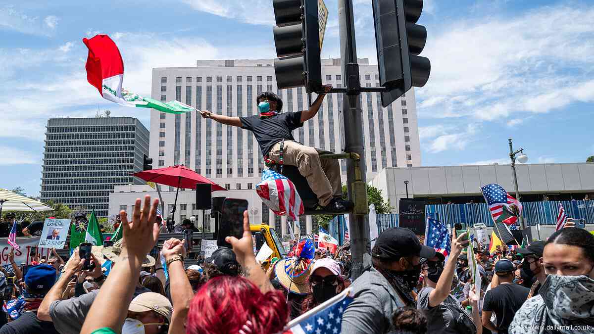 Man arrested after 'intentionally' driving into crowd of protesters at 'No Kings Day' rally in Virginia