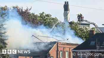 Six crews tackle building fire near town centre