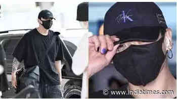 Is there a reason behind BTS Jungkook's single blue nail paint?