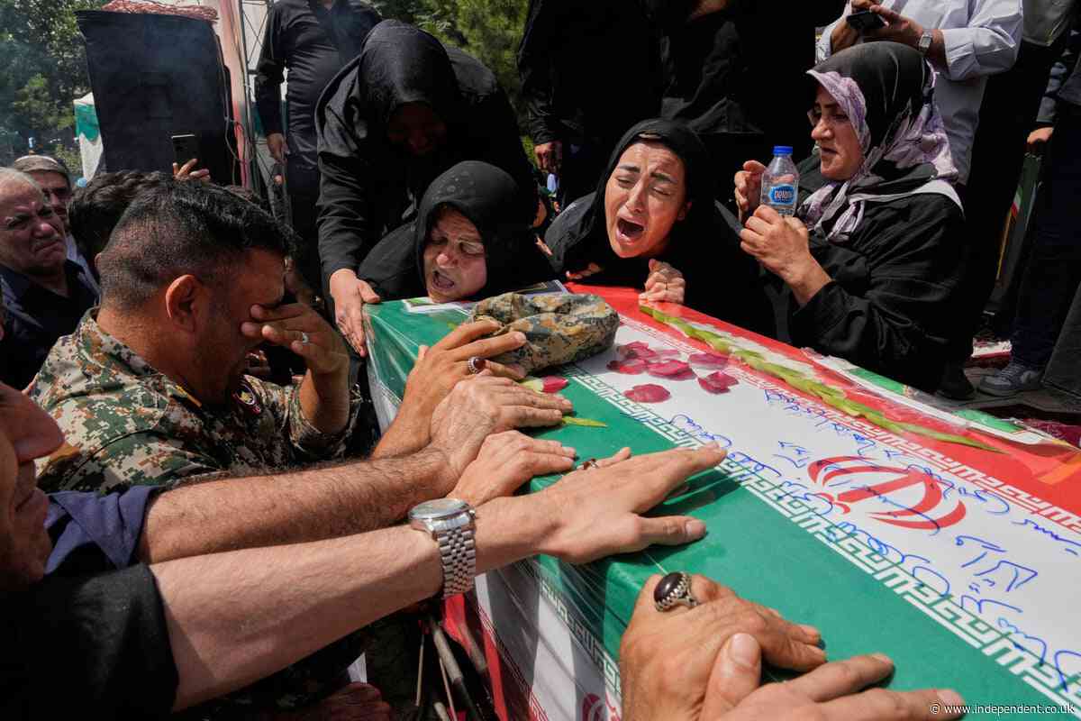 Iran's government says at least 1,060 people were killed in the war with Israel