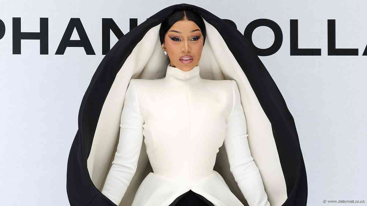 Cardi B, 32, models flamboyant hooded dress while Kate Walsh, 57, goes naked under risqué white gown at Stéphane Rolland's Paris Fashion Week show