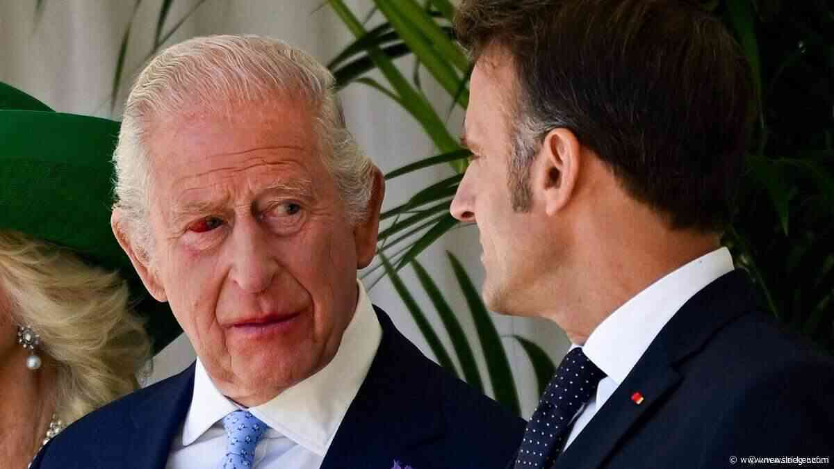 Koning Charles met rood oog bij ontvangst Emmanuel Macron