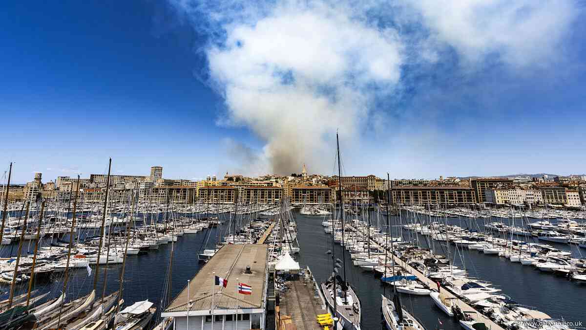 'Apocalyptic' wildfire closes in on Marseille, tornadoes form in the Med and Greece shuts Acropolis amid 42C heatwave while SNOW falls in Switzerland as Europe's extreme weather continues
