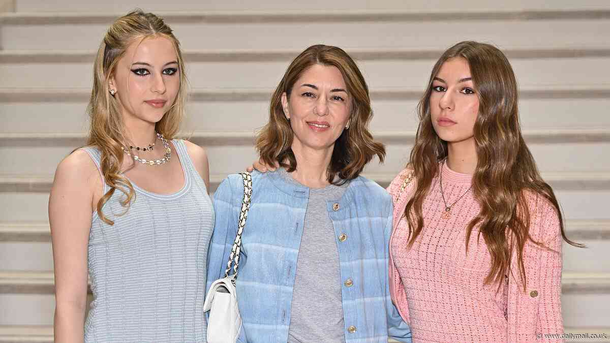 The Godfather actress Sofia Coppola, 54, poses with her teen daughters who are both taller than she
