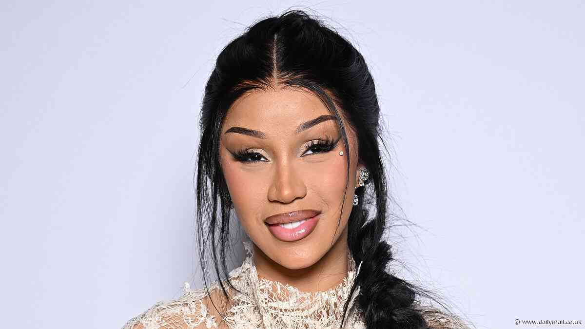 Cardi B wears a semi-sheer lace gown as she opts for a more understated look after turning heads with bizarre outfits during Paris Fashion Week
