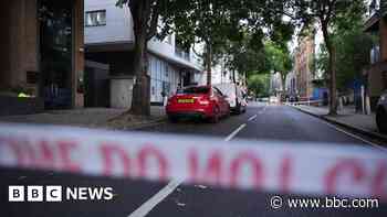 Two dead and two injured in attack at business