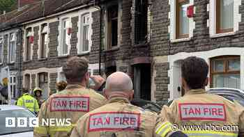 Four arrested after early morning house fire