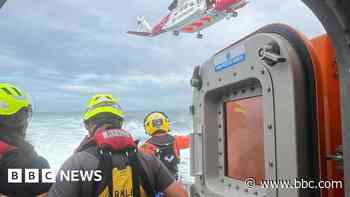 Man pulled from sea after yacht sinks off Welsh coast